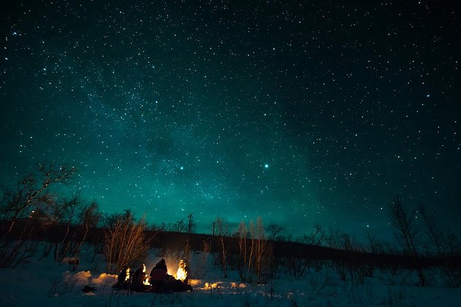 Tromso Aurora Hunt with Bonfire, Soup, Winter Gear & Transfers - Meeting point, drop-offs, and practical limits