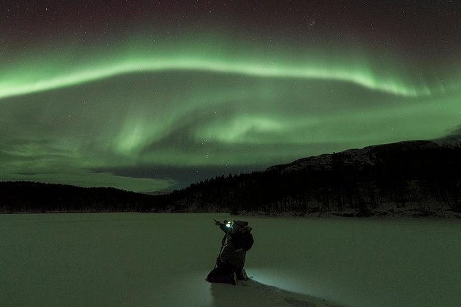 Tromso Aurora Hunt with Bonfire, Soup, Winter Gear & Transfers - Arriving at camp, firelight, and soup