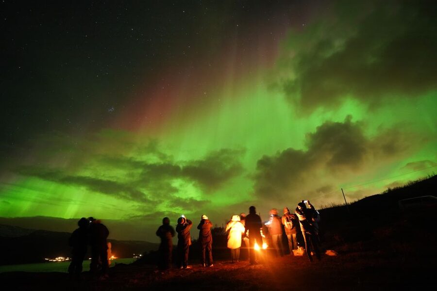 Tromsø: Chase Aurora in Minibus and Free Aurora Portrait - A viewing site, a fire, and time to look up