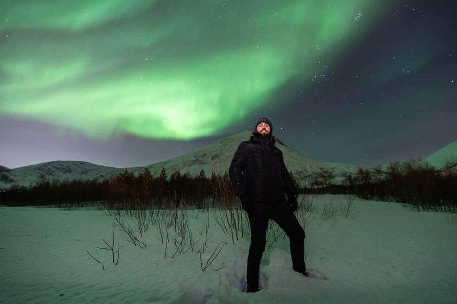 Tromsø: Exclusive Northern Lights Chase with Photos - Photo stops, camera help, and extra image costs