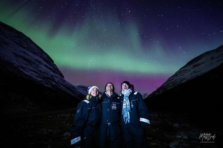 Tromsø: Northern Lights Chase with Expert Guides & Photos - Waiting beside a fire in the Arctic