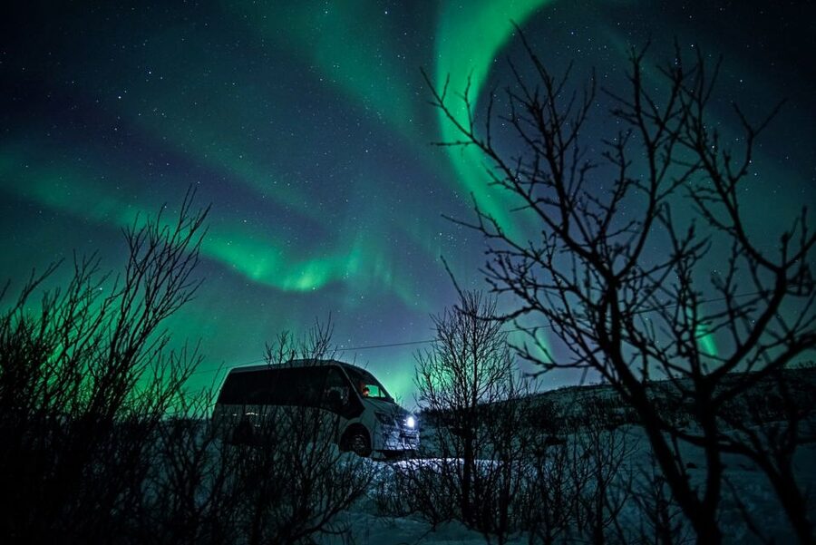Tromsø: Northern Lights Chase with Photos and Bodysuits - Waiting outdoors in a thermal suit