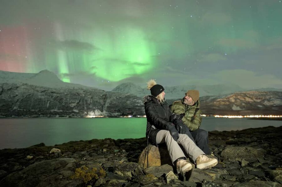 Tromsø: Northern Lights Hunt with a Professional Photographer in Italian - Leaving Tromsø behind the city lights