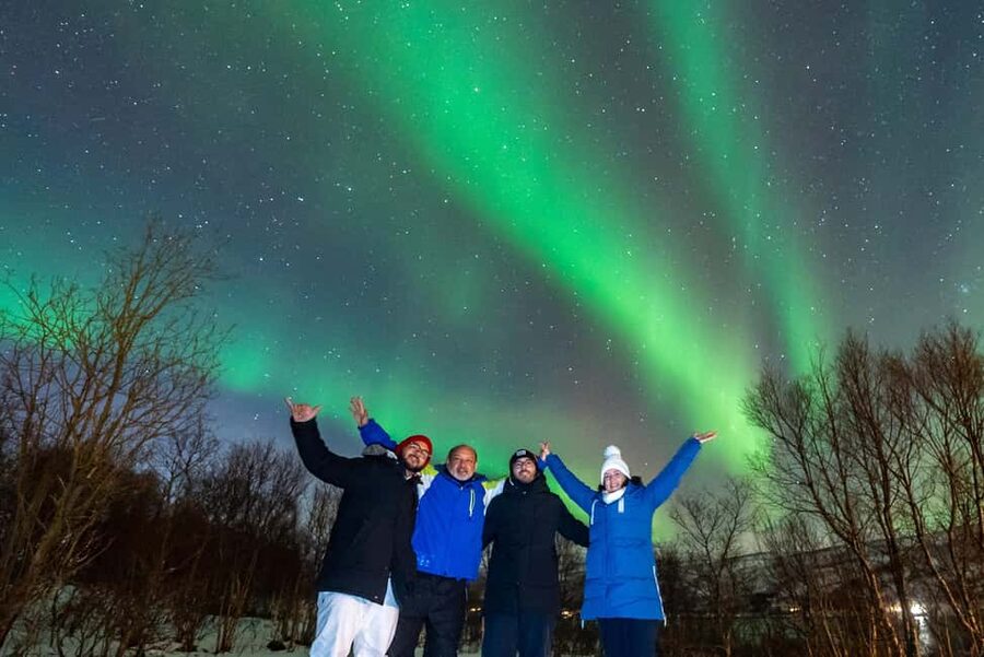 Tromsø: Northern Lights Tour with Photos, Hot Meal & Drinks - Following the clearest sky, sometimes beyond Norway