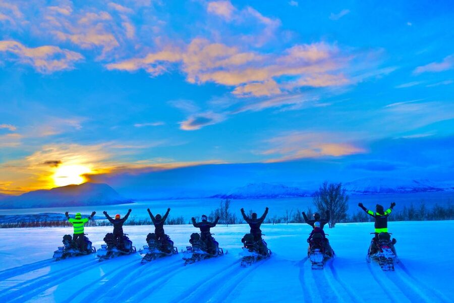 Tromsø: Snowmobile Tour with Aurora Crystal Lavvo Stay - Riding beneath the Lyngen Alps
